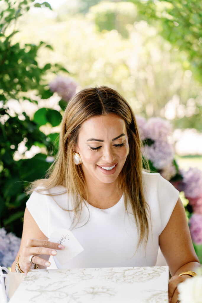 Smiling bridesmaid during a Hamptons bridesmaid proposal session in Amagansett, captured as part of East End event photography.