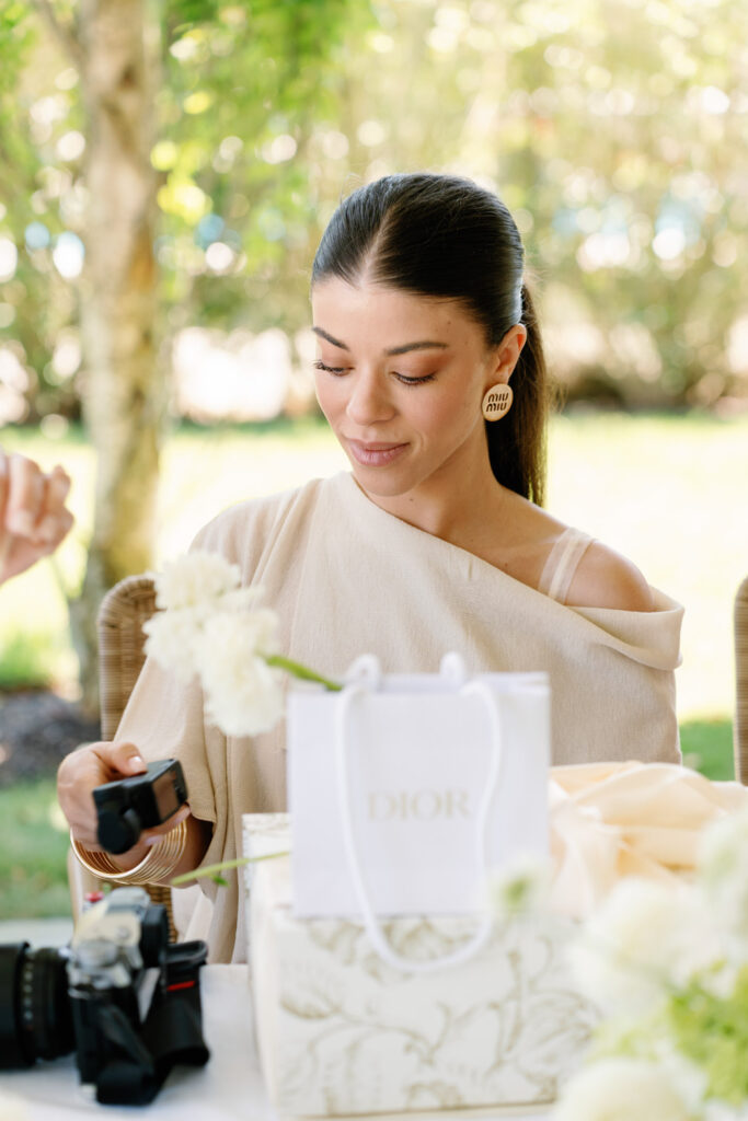 Smiling bridesmaid during a Hamptons bridesmaid proposal session in Amagansett, captured as part of East End event photography.