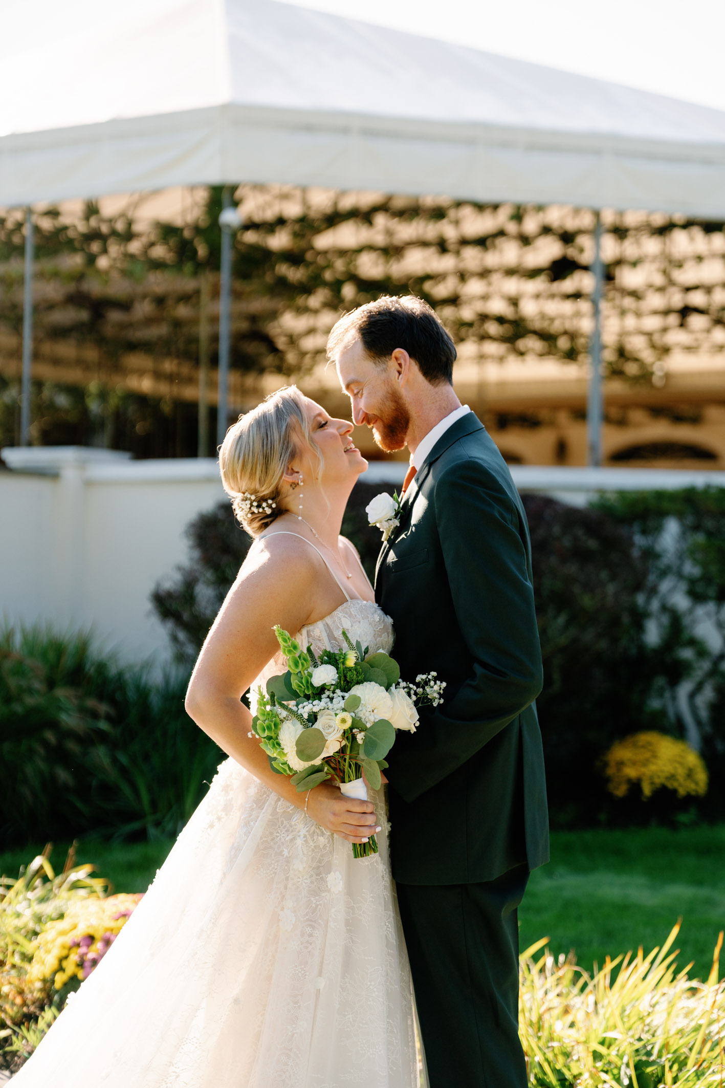 bride and groom on their wedding day at the Vineyards