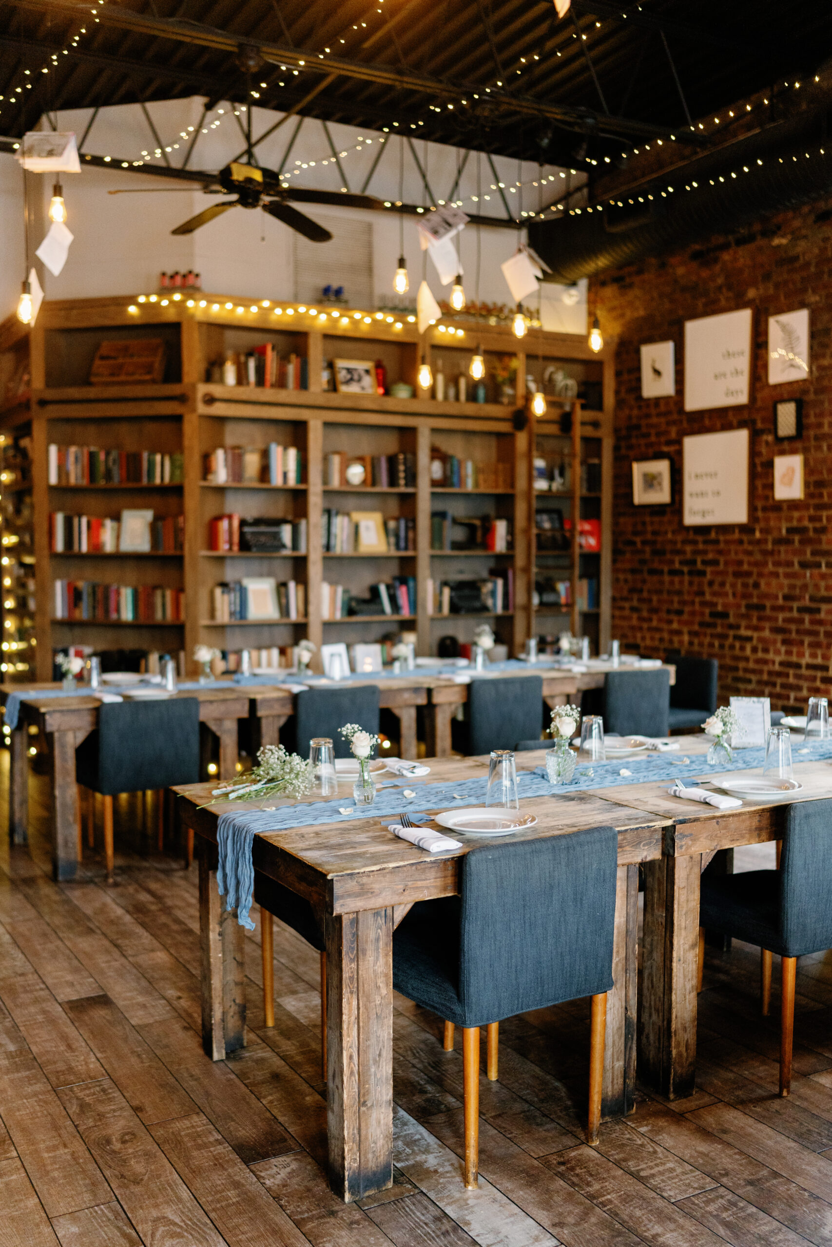 dining room set up in dusty blue decor for a bridal shower